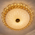 Aurelia Crown Luxury Crystal Ceiling Light with golden crystal detailing and LED illumination, ideal for upscale home lighting décor.