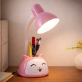 KittyGlow Pink Kids Desk Lamp with cute cat face design, flexible neck, and built-in pen holder for organized study spaces.