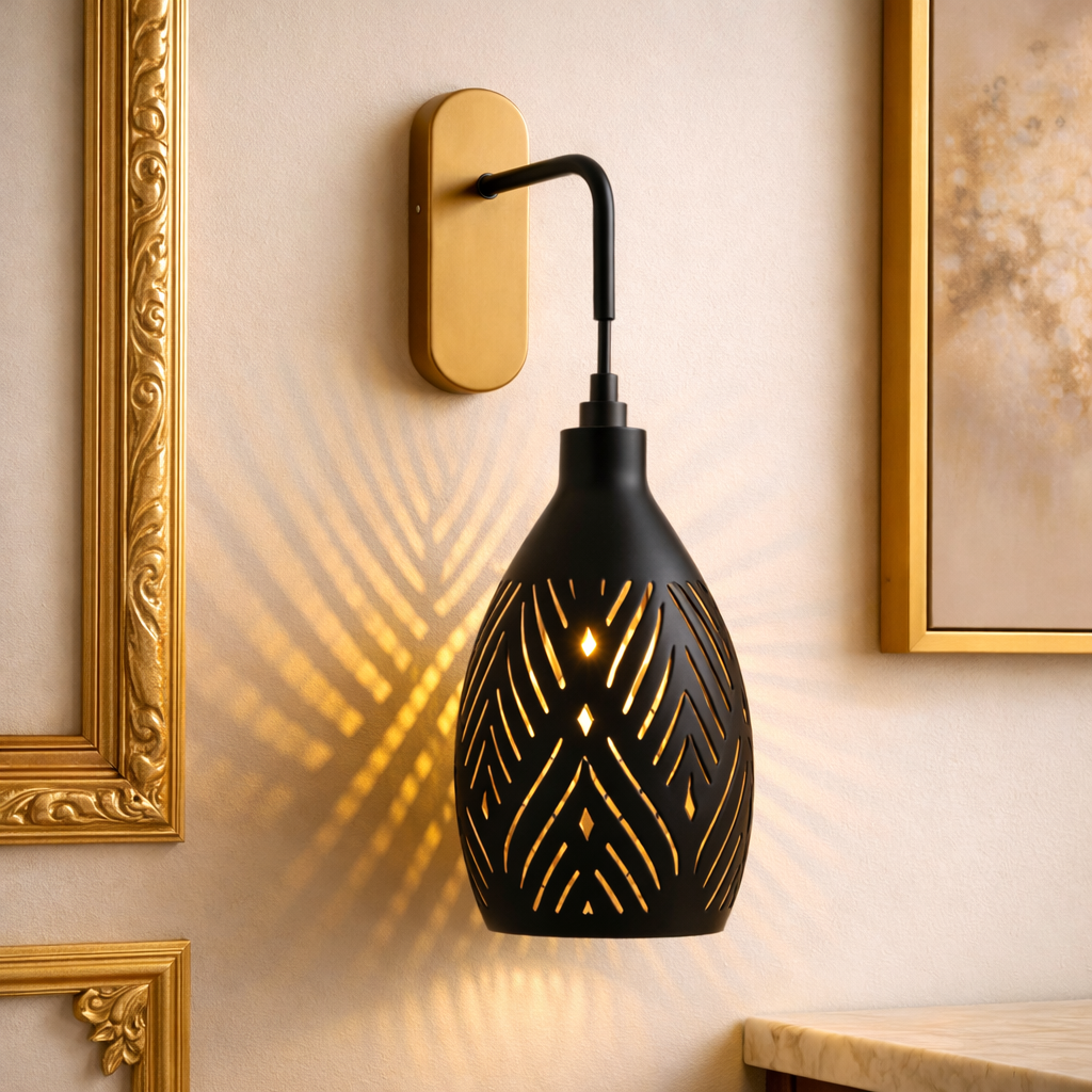Luxury wall sconce lighting with black matte finish and gold interior, casting artistic shadows. Ideal for elegant interiors and designer illumination.