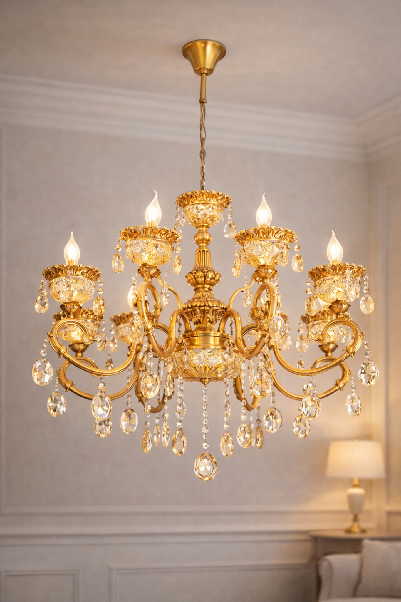 Luxury Crystal Chandelier for Living Room India with elegant gold finish and LED candle-style lights, ideal for upscale interiors and villas.