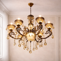 Imperial Heritage Chandelier with gold finish and luxury crystal drops, perfect for elegant interiors in India. Features ornate arms and warm LED lights.