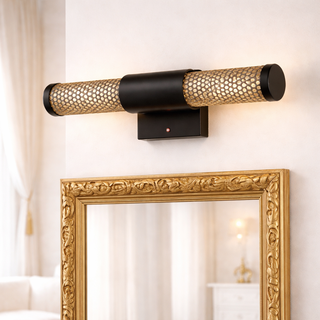 Imperial NoirGlow LED Wall Light with black and gold mesh design mounted above a mirror. Ideal for luxury interiors and modern wall lighting.