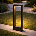 Rectangular LED Outdoor Light illuminating a garden pathway with soft, glare-free lighting. Shop Rectangular LED Outdoor Light for luxury landscape lighting.