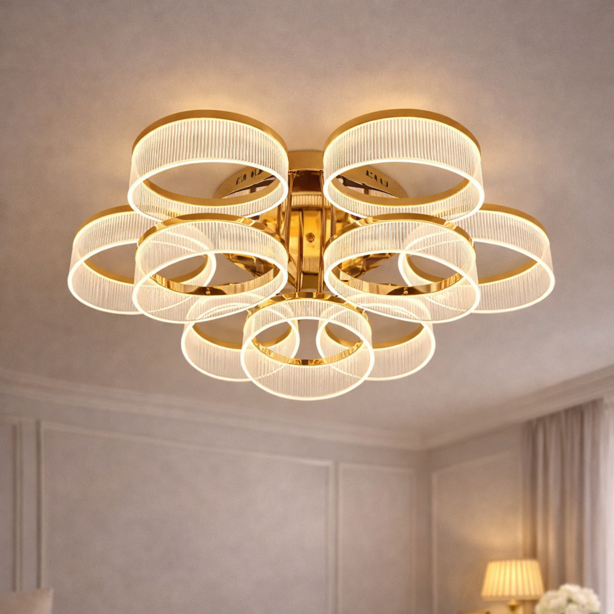 Aurelia Rings Luxury Gold LED Ceiling Chandelier with multi-ring design and warm illumination, perfect for modern living room interiors.