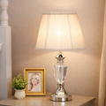 Luxury Crystal Table Lamp India with pleated fabric shade and chrome base, ideal for elegant bedrooms and soft ambient lighting.
