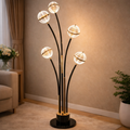 LumiBloom Floor Lamp with five glowing glass globes on curved black and gold stems. Modern multi globe floor lamp adds artistic lighting to luxury interiors.