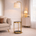 Luxury lamp with integrated side table in gold finish, featuring a modern design ideal for elegant living rooms. Combines lighting and storage in one.