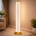 Luminara Column gold modern floor lamp with soft glow and minimalist cylindrical design, ideal for elegant living room interiors.