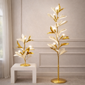 Luxury Floral Lamps Set for Elegant Homes featuring gold and white flower-inspired floor and table lamps. Premium lighting for modern Indian interiors.